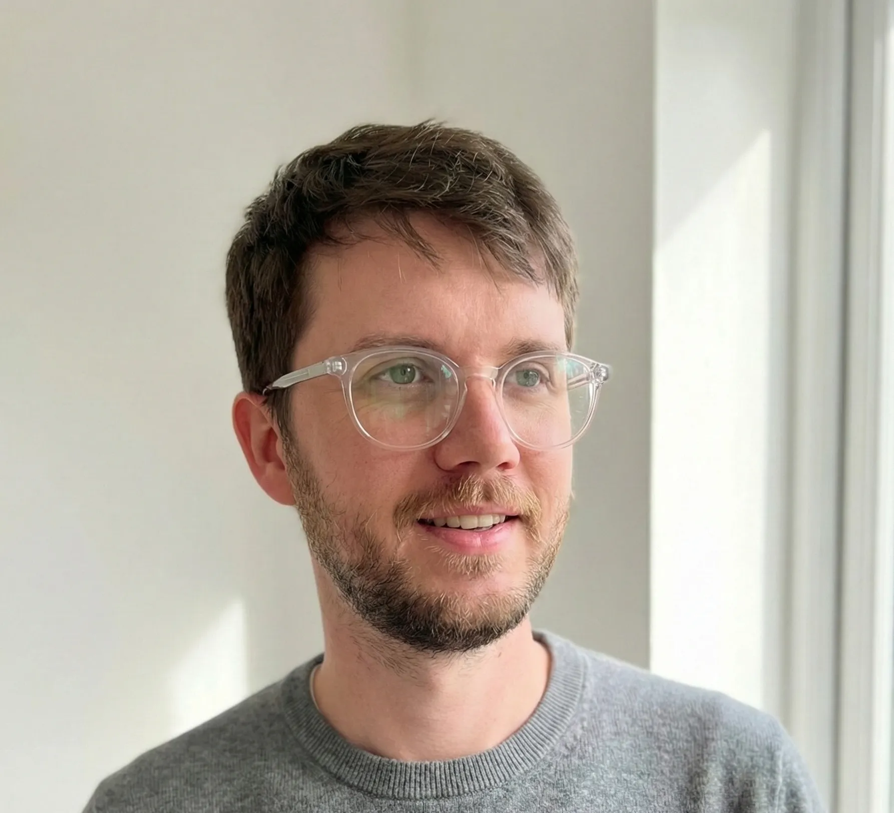 Phil working on a laptop